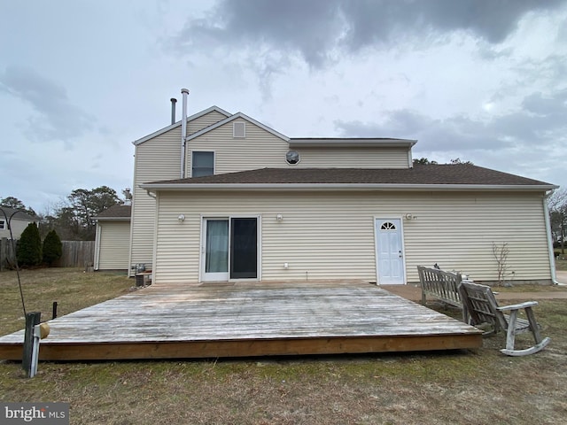 rear view of property with a deck