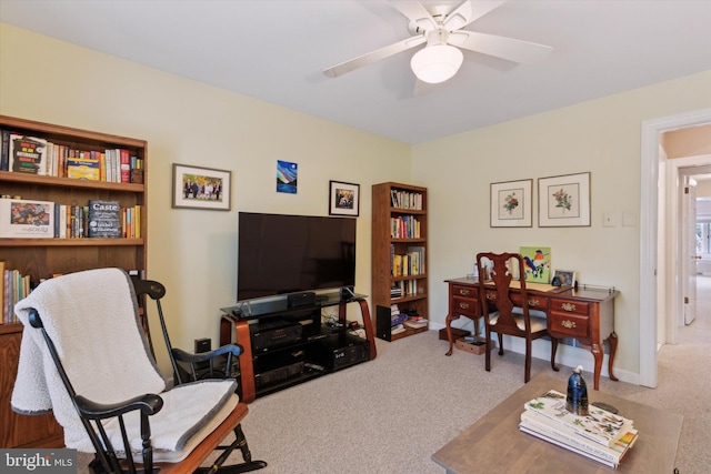 office space with carpet and ceiling fan