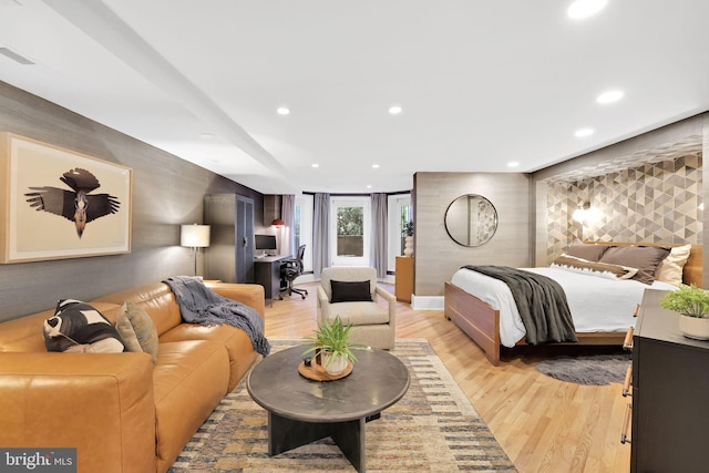 bedroom with visible vents, light wood-style flooring, and recessed lighting