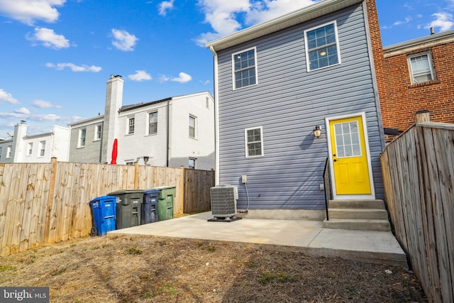 back of house featuring a patio and central AC