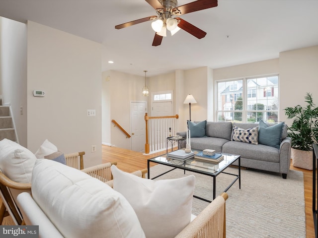 living room with light hardwood / wood-style flooring