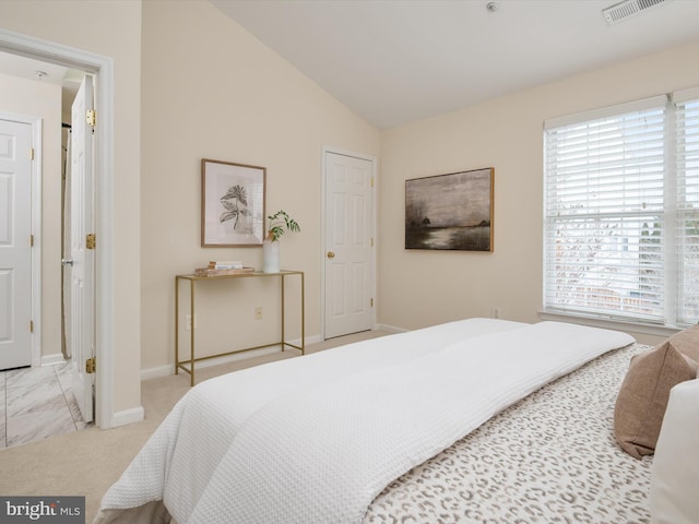 bedroom with vaulted ceiling