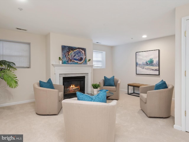 living room featuring light colored carpet