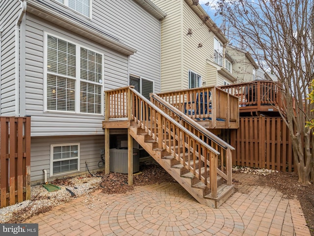 exterior space with cooling unit and a patio area