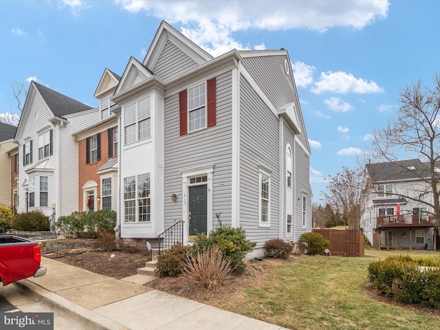 view of front of house with a front lawn