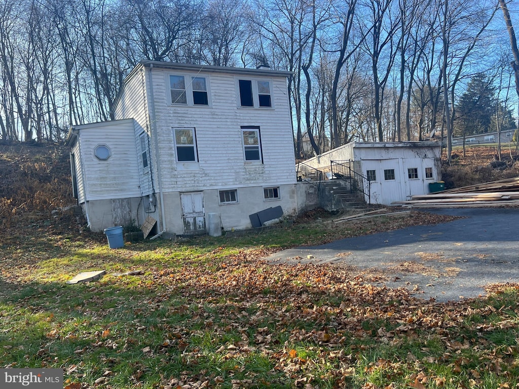 exterior space with a shed