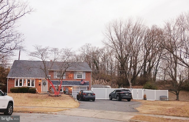 view of front of property featuring a garage