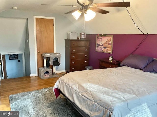 bedroom featuring wood-type flooring and ceiling fan