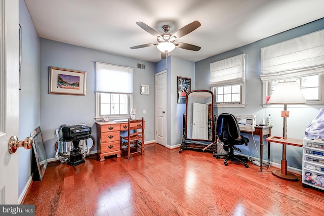 office area with ceiling fan and wood-type flooring