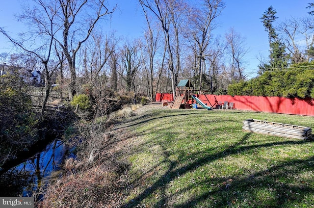 view of yard featuring a playground