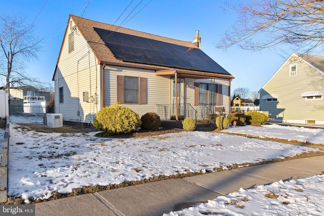 view of front of home with solar panels