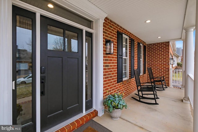 doorway to property with covered porch