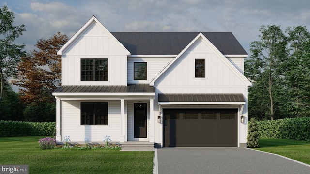 modern inspired farmhouse featuring a garage and a front lawn