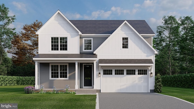 view of front facade featuring a garage and a front lawn