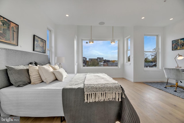 bedroom with light wood-type flooring