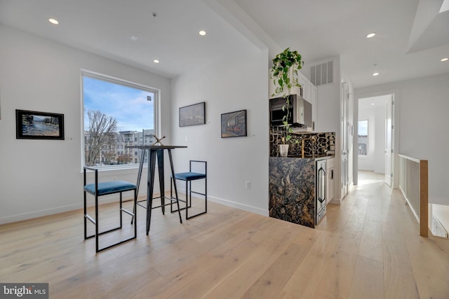 dining area with light wood-type flooring