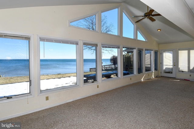 unfurnished sunroom featuring a water view, lofted ceiling, and ceiling fan