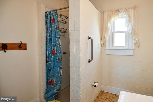 bathroom featuring a shower with curtain