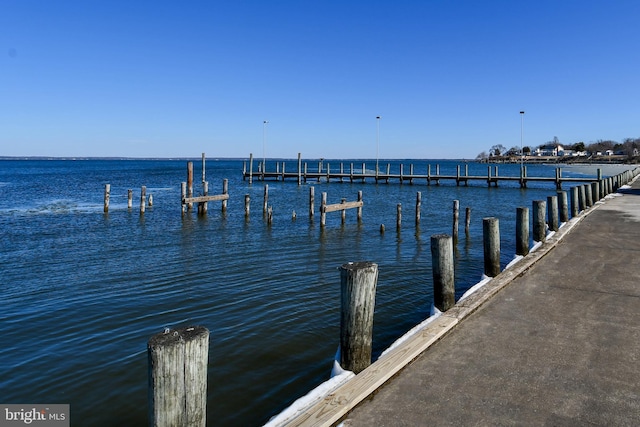 view of dock with a water view