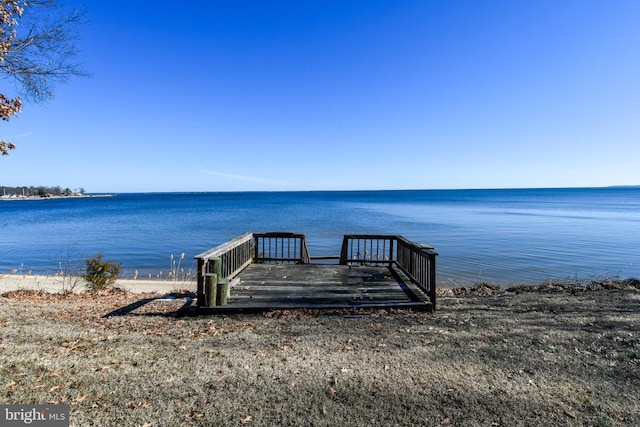 dock area featuring a water view