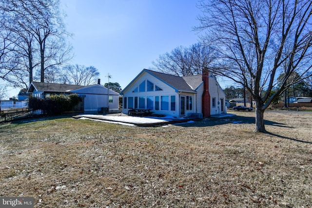 exterior space featuring a yard and a patio