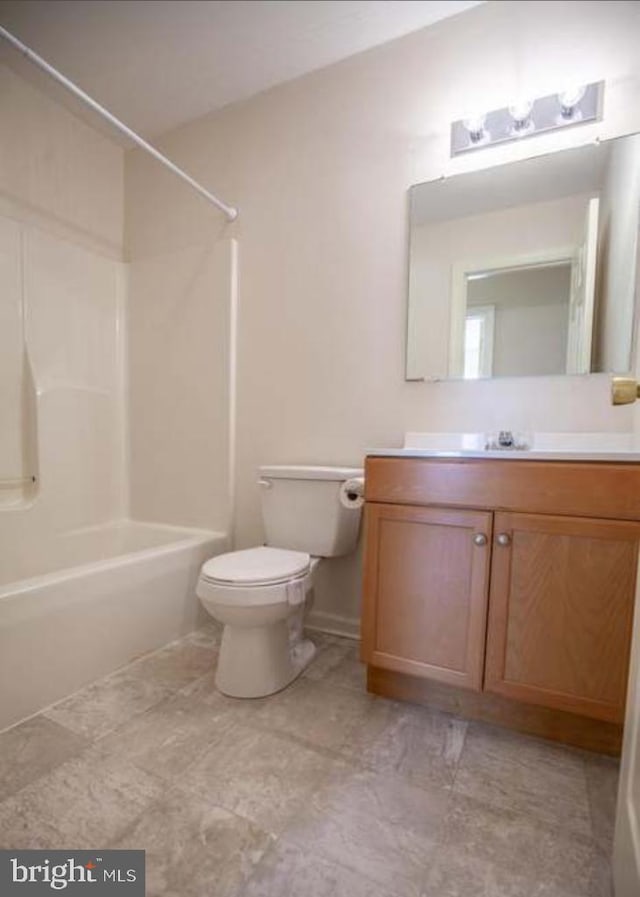 full bathroom with vanity, shower / bathing tub combination, and toilet