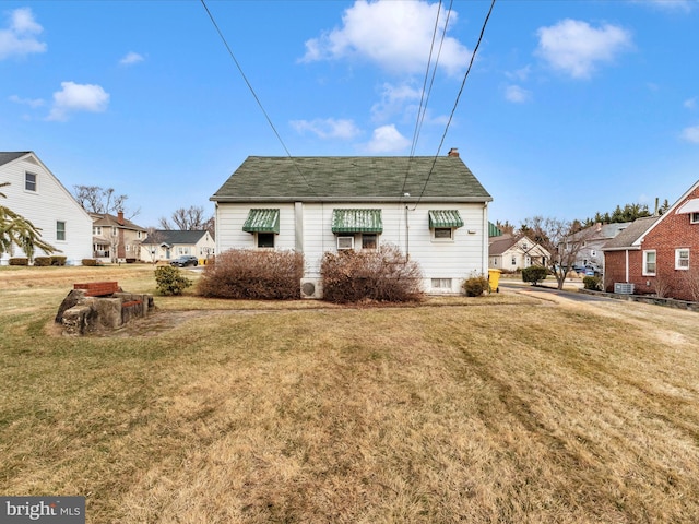 exterior space with a yard