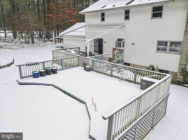 view of snow covered deck