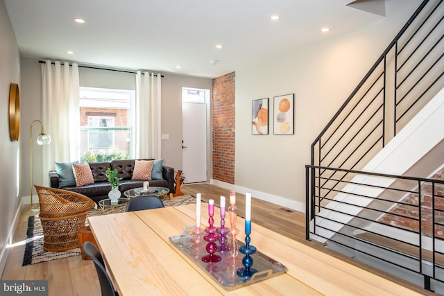 dining room featuring wood-type flooring