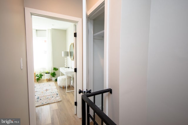 hallway with light wood-type flooring