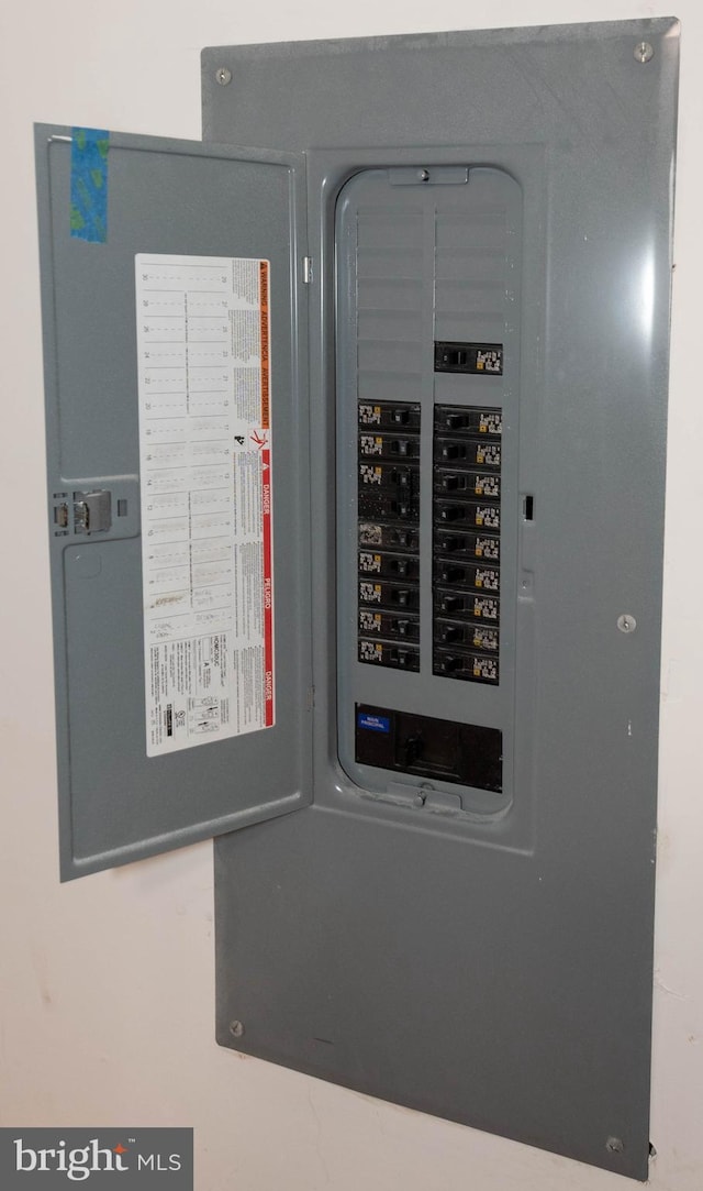 utility room featuring electric panel