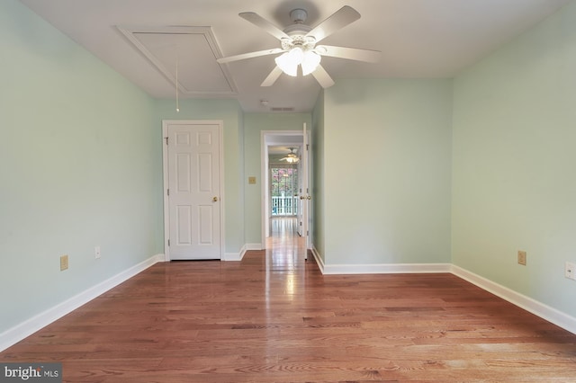 unfurnished room featuring wood-type flooring and ceiling fan