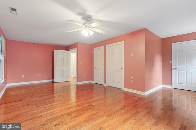 unfurnished bedroom featuring light hardwood / wood-style floors and ceiling fan