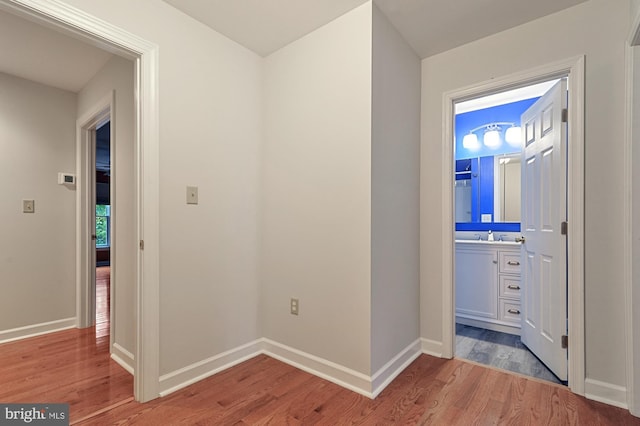 hallway featuring light wood-type flooring