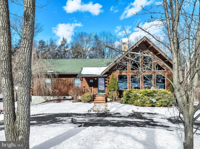 view of log cabin