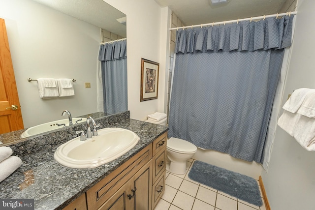 full bathroom with tile patterned floors, toilet, shower / tub combo, and vanity