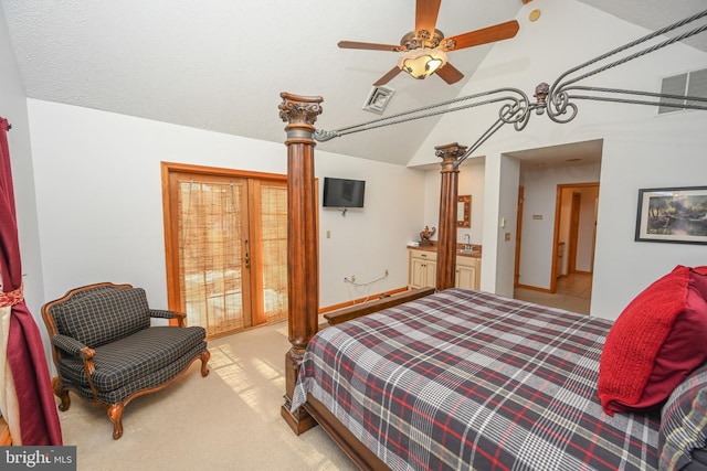 carpeted bedroom with lofted ceiling and access to outside