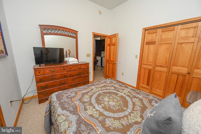 carpeted bedroom with lofted ceiling