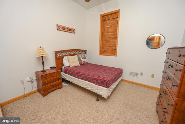 bedroom with light carpet