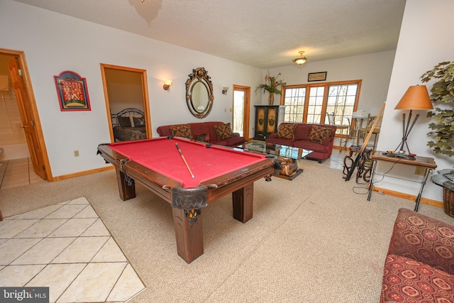 playroom with billiards, light carpet, and a textured ceiling