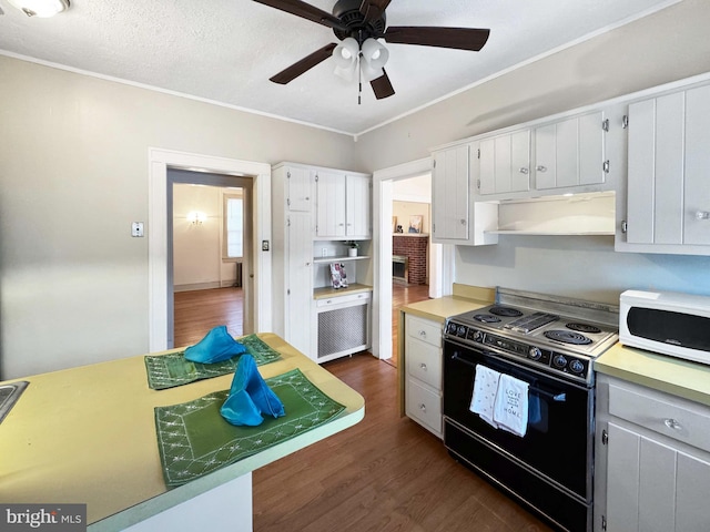 kitchen with white cabinets, dark hardwood / wood-style flooring, ceiling fan, a textured ceiling, and black / electric stove