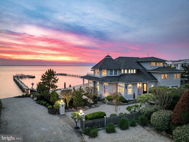 view of front of property featuring a water view