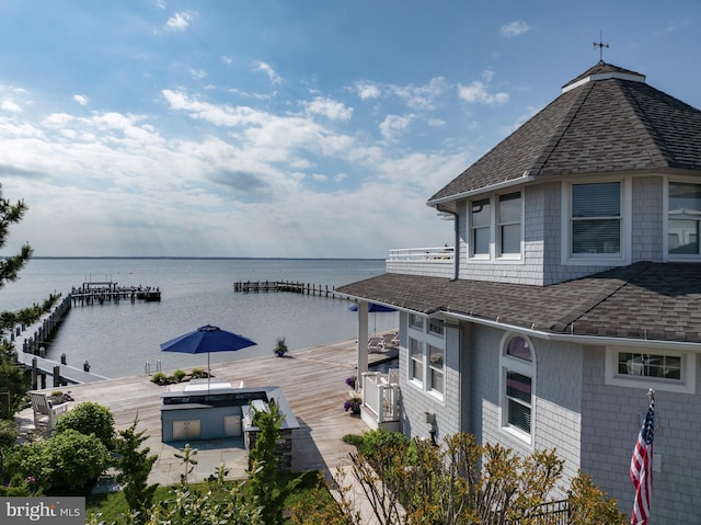 dock area with a water view