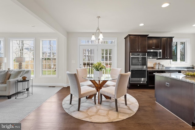 dining room featuring dark wood-type flooring