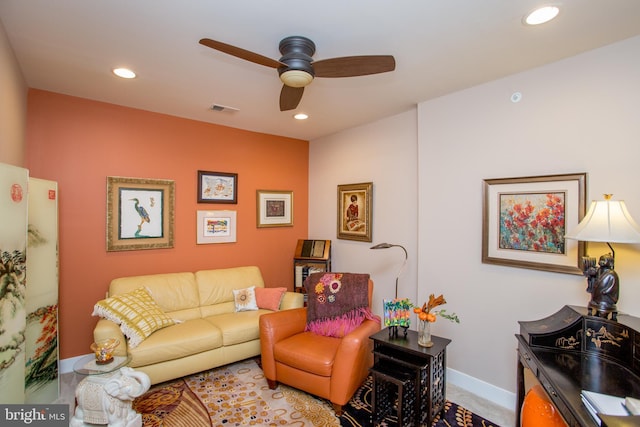 living room with carpet floors and ceiling fan