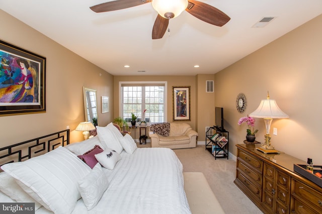 carpeted bedroom with ceiling fan