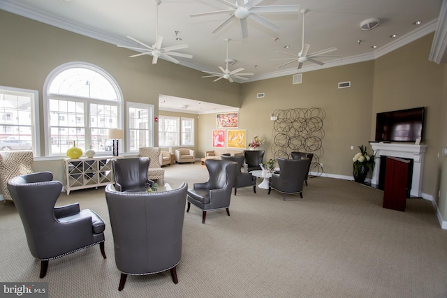 living room with light carpet and crown molding