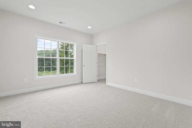 14496 Aurora Dr, Woodbridge, VA 22193 - unfurnished bedroom with baseboards, carpet floors, recessed lighting, and a spacious closet