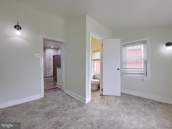 519 Locust St, Columbia, PA 17512 - spare room featuring baseboards