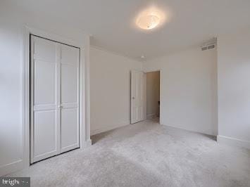 519 Locust St, Columbia, PA 17512 - unfurnished bedroom featuring carpet floors and a closet